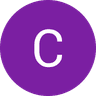 White letter C inside a solid purple circle on a black background.