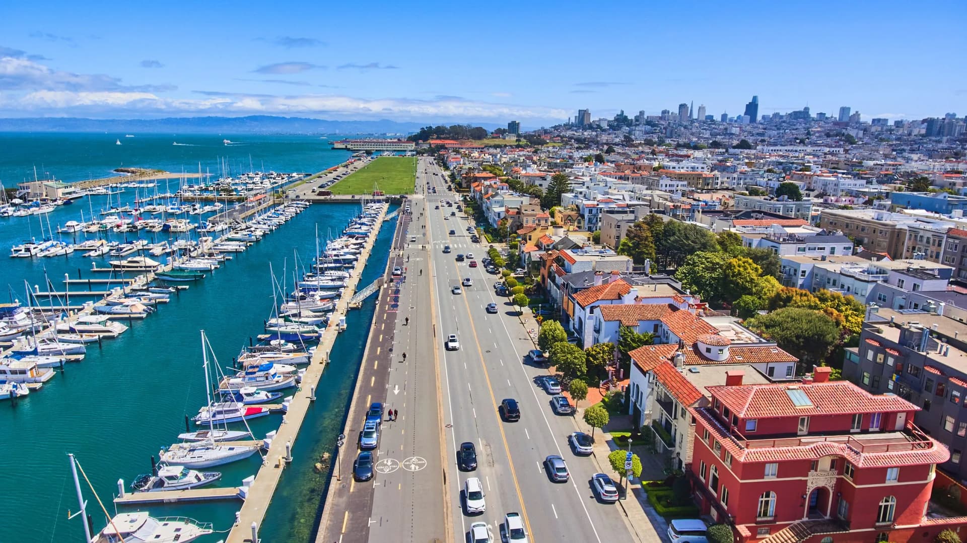 Aerial over harbor and colorful beach homes in San Francisco, California